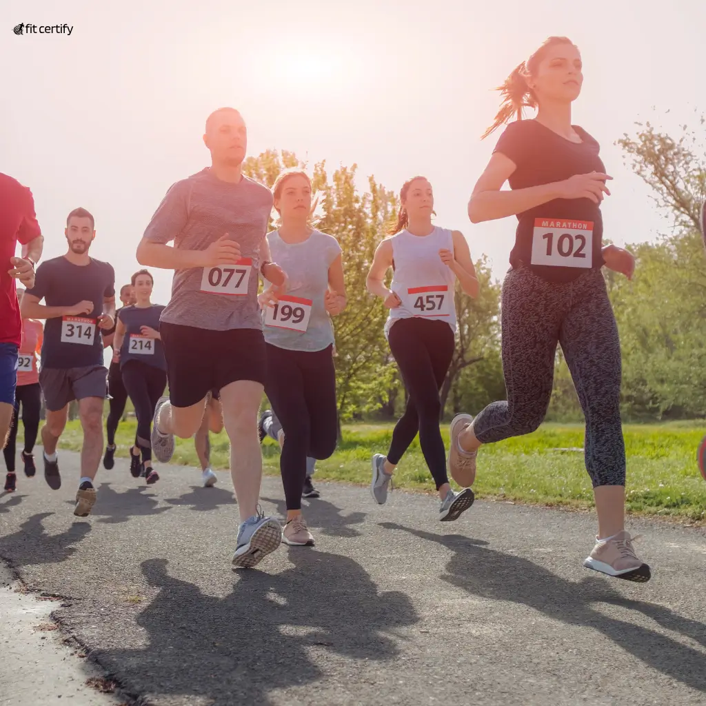 A group of runners participating in a marathon after obtaining a fit to run medical certificate from Fit Certify.