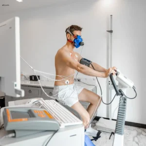 A man undergoing diagnostic testing for a sports medical certificate.