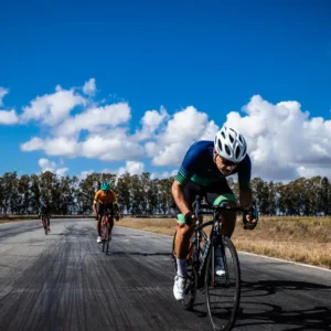 An image of a group of cyclists participating in an Italian cycling race, after getting a medical certificate of no contraindication for competitive cycling from Fit Certify.